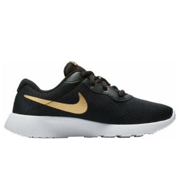 black nike sneakers with gold swoosh